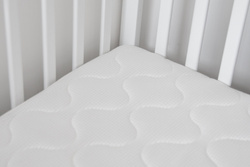 Łóżeczko dla niemowląt Natulino DreamNest 120 x60 z materacem PURE AIR Plain (piankowy)     